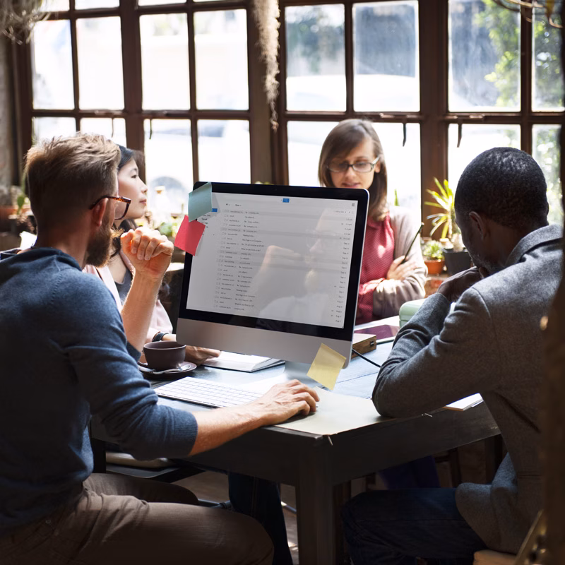 Business professionals in a corporate conference room meeting