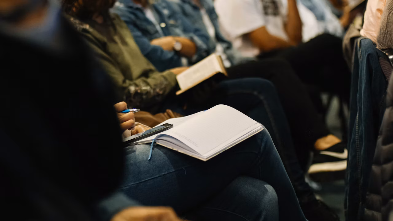 students taking notes in a college setting